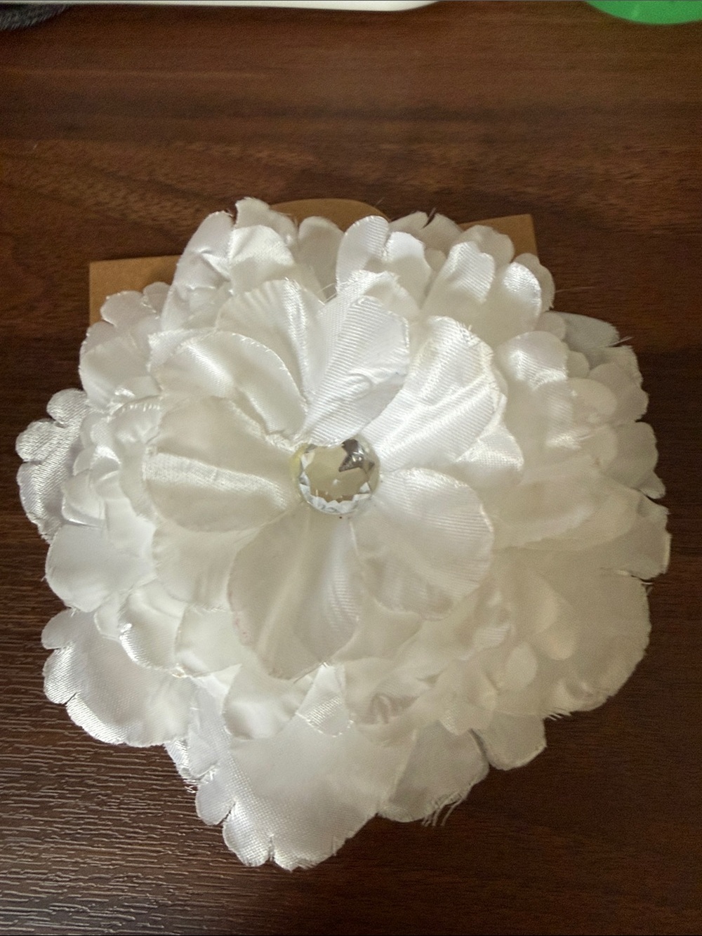 White flower hair clip with rhinestone center